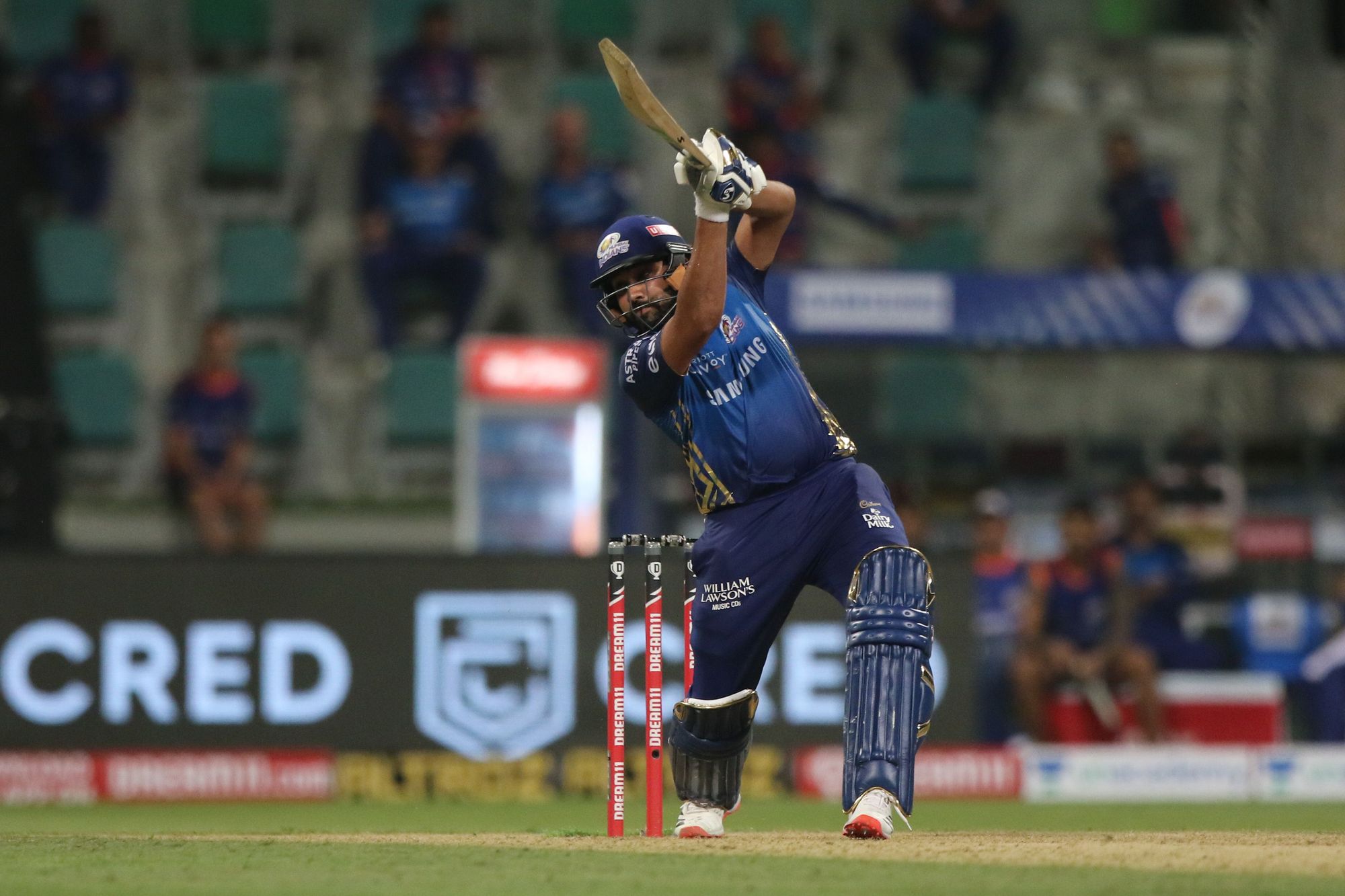 Rohit playing a drive against KKR