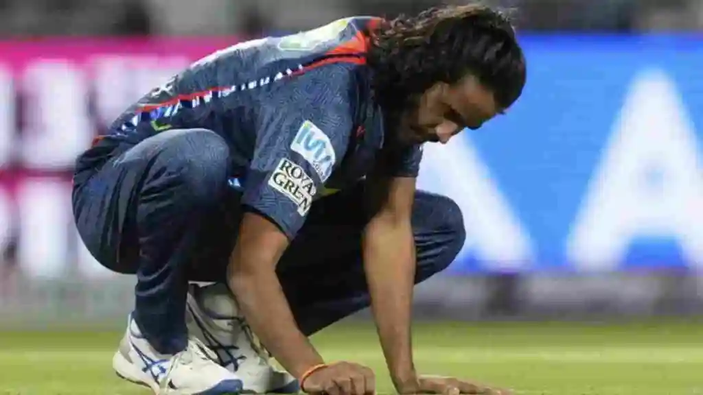 LSG's Digvesh Rathi signs the turf after dismissing a batter in IPL 2025.
