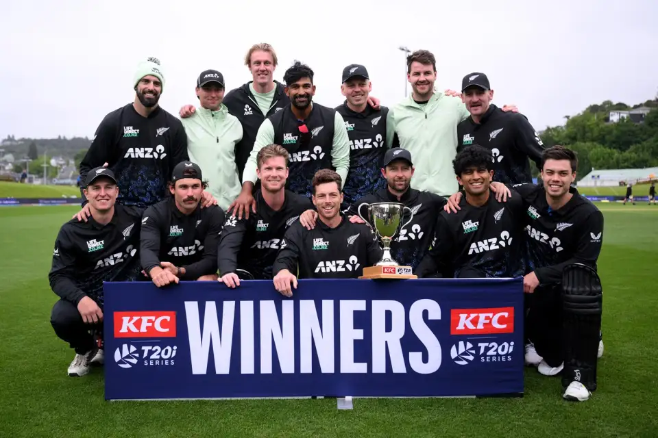 The New Zealand squad poses with the trophy after clinching the series against West Indies 3-1 with an eight-wicket win in the fifth T20I in Dunedin
