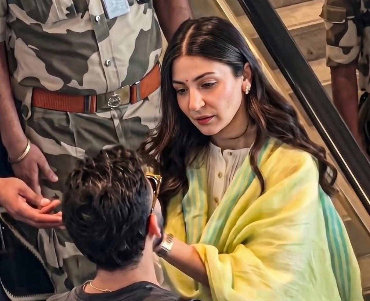 Watch Virat Kohli and Anushka Sharma Share a Wholesome Moment at the Airport.